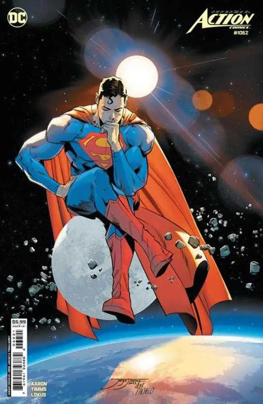 Superhero in blue suit and red cape floating above Earth on Action Comics #1062 cover