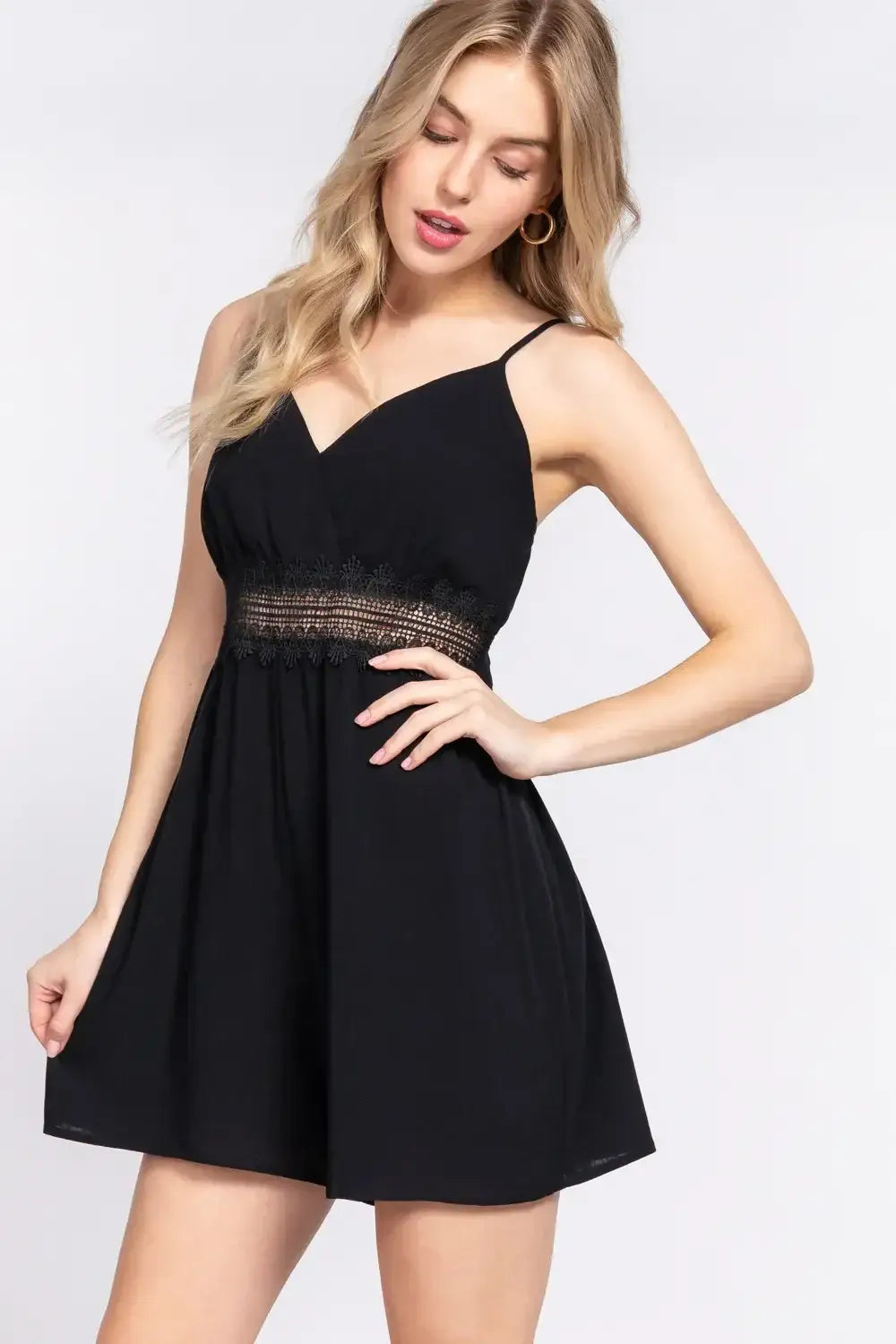 Black mini dress with spaghetti straps and waist lace trim for stylish lace trim cami look