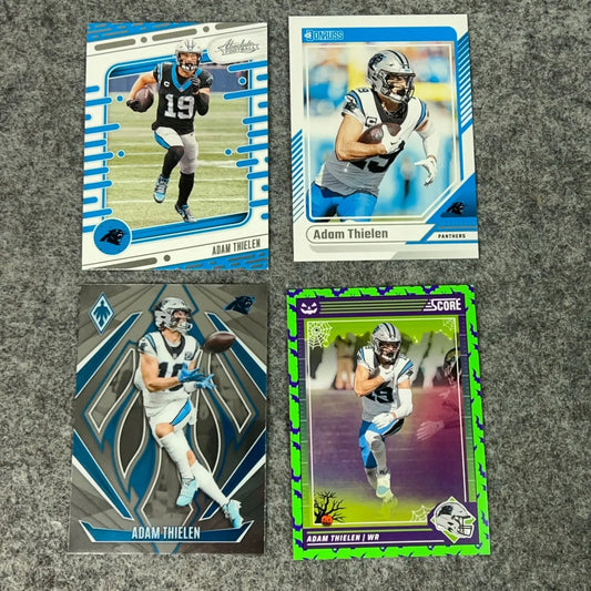 Collection of four Adam Thielen Carolina Panthers football trading cards displayed in a product image