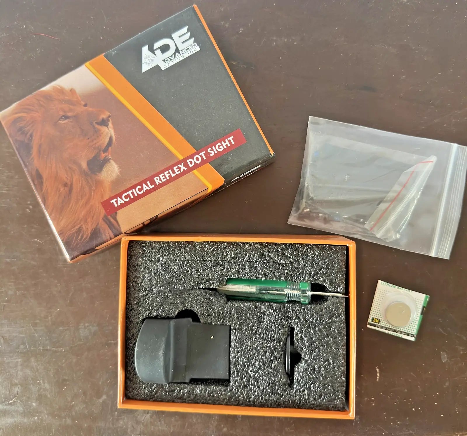 Ade Advanced Optics Delta Red Dot Reflex Sight with accessories in packaging