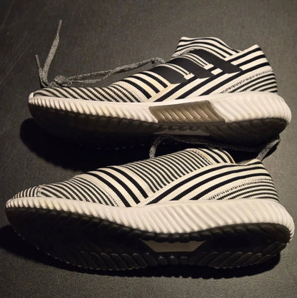 Black and white striped Adidas Sneakers Mens 9 with slip-on knit design and white soles