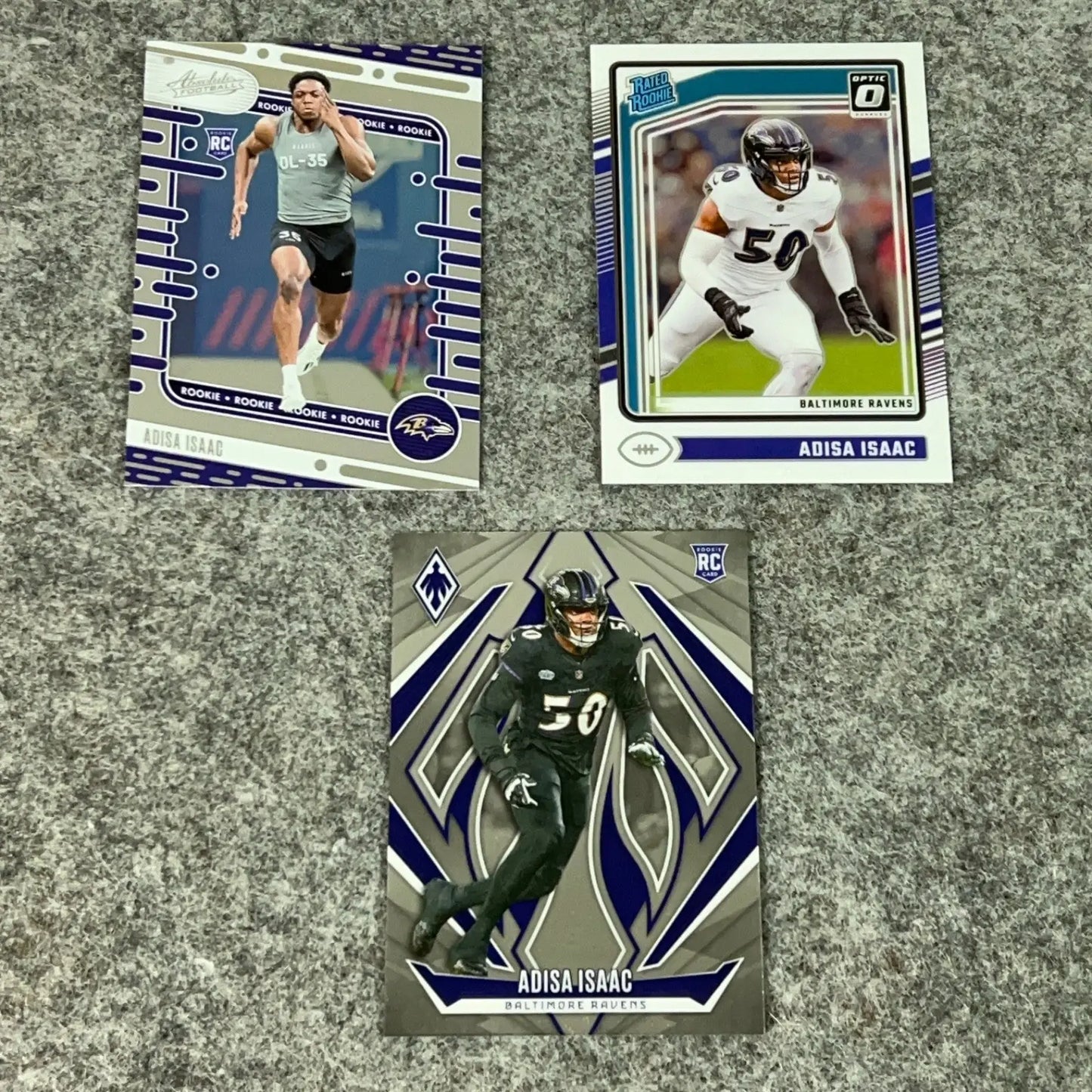 Three Adisa Isaac rookie football cards from the Baltimore Ravens complete set