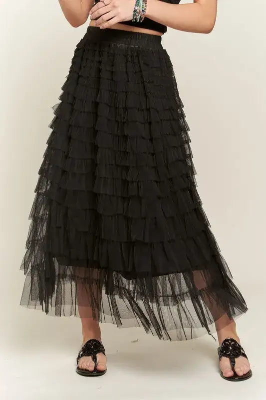 Black layered mesh midi skirt with ruffled tiers and elastic waist for stylish wear