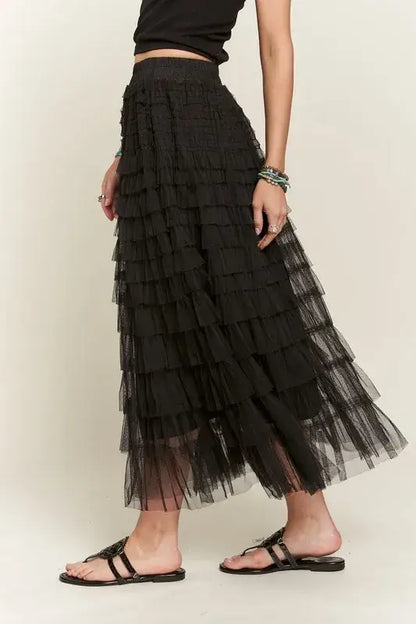 Black layered mesh midi skirt with ruffled tiers and elastic waist layered design