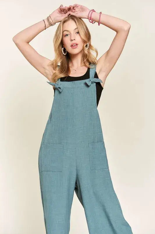 Teal knotted wide strap linen overalls with wide strap wide leg and front pockets