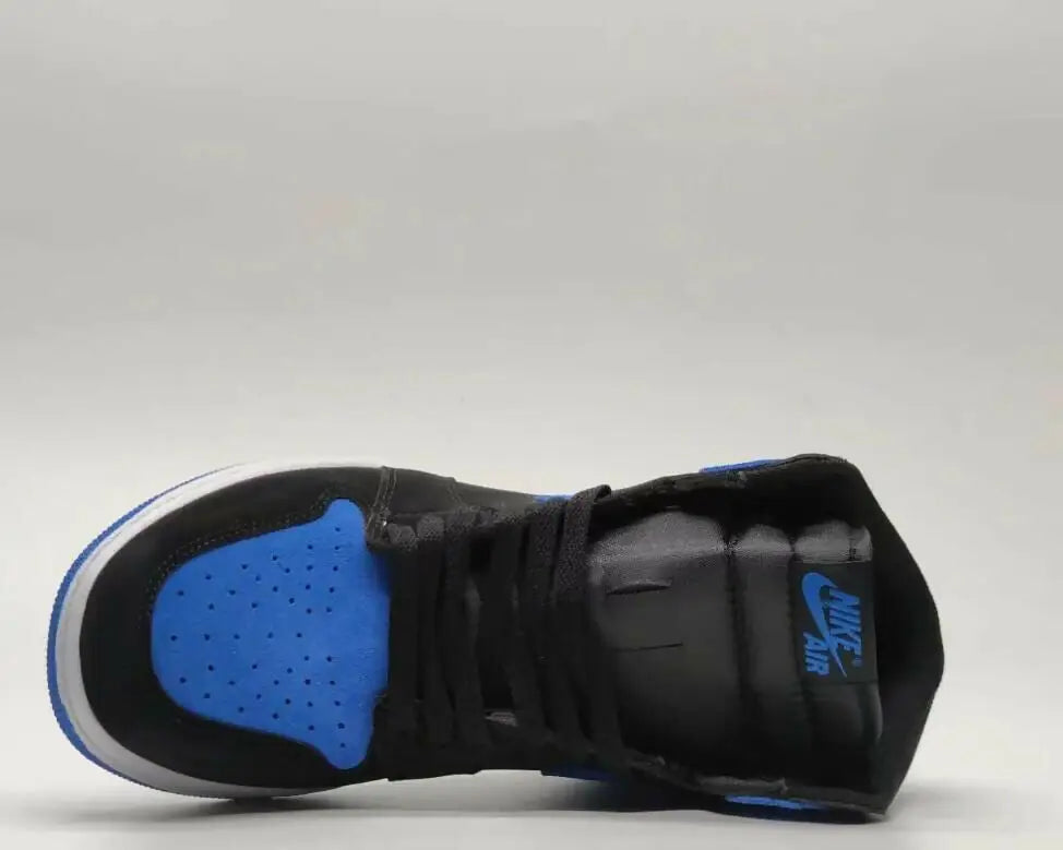 Black and blue Air Jordan 1 High OG Royal Blue sneaker with white sole, fast shipping