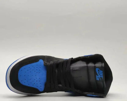 Black and blue Air Jordan 1 High OG Royal Blue sneaker with white sole, fast shipping