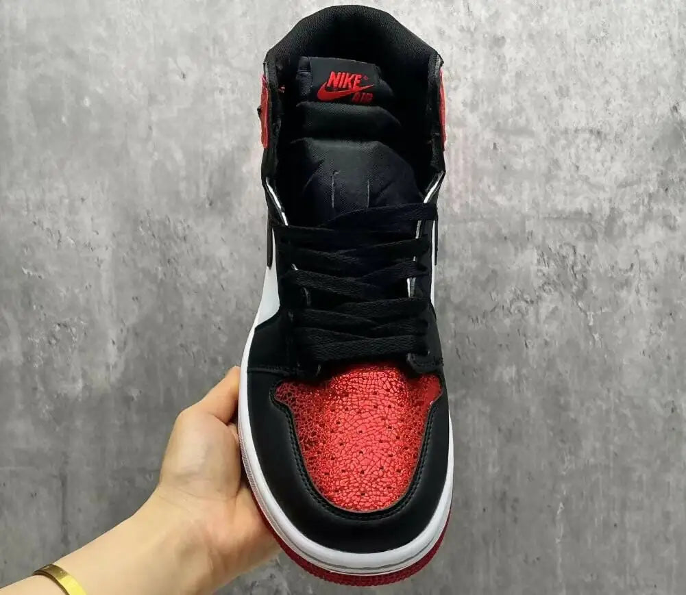 Air Jordan 1 High OG Ruby sneaker with black, red, white, and sparkly toe box, fast shipping