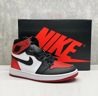 Black, red, and white Nike Air Jordan 1 High OG Ruby sneakers with fast shipping