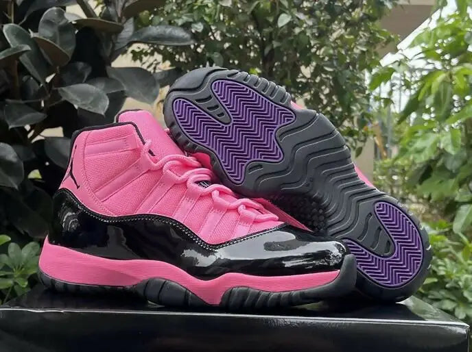 Pink and black Air Jordan 11s with purple soles, fast shipping, available in business days