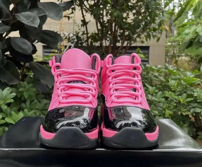 Air Jordan 11 Black Pink high-top sneakers with patent leather accents, fast shipping available