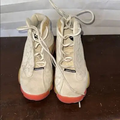 Air Jordan 13 Retro Chinese New Year beige pink high-top sneakers with red soles