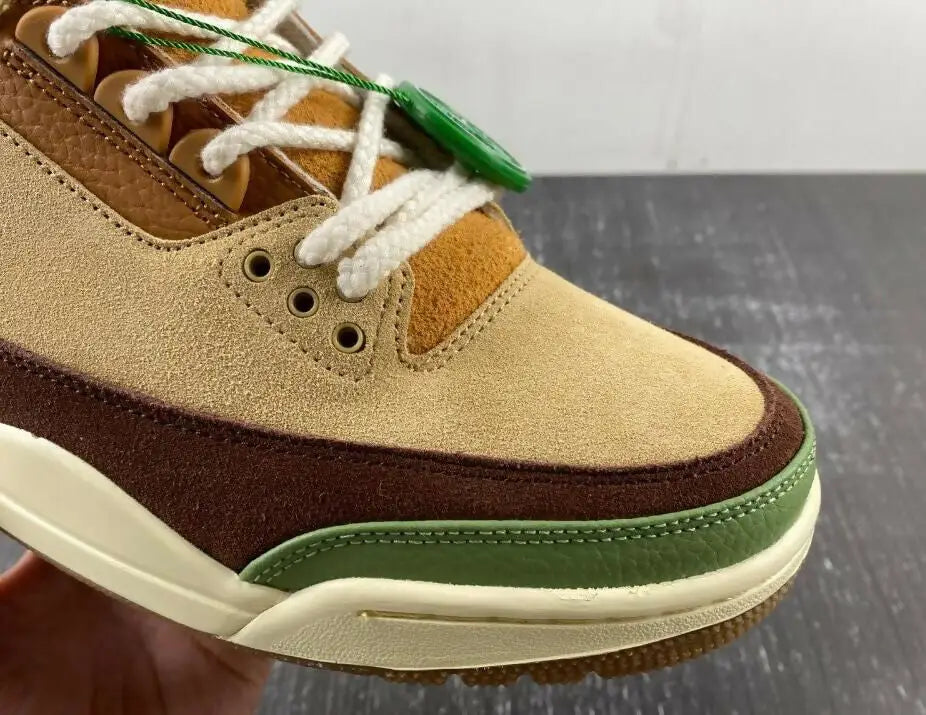 Air Jordan 3 Zion Williamson Voodoo sneaker with suede leather, white laces, green tag