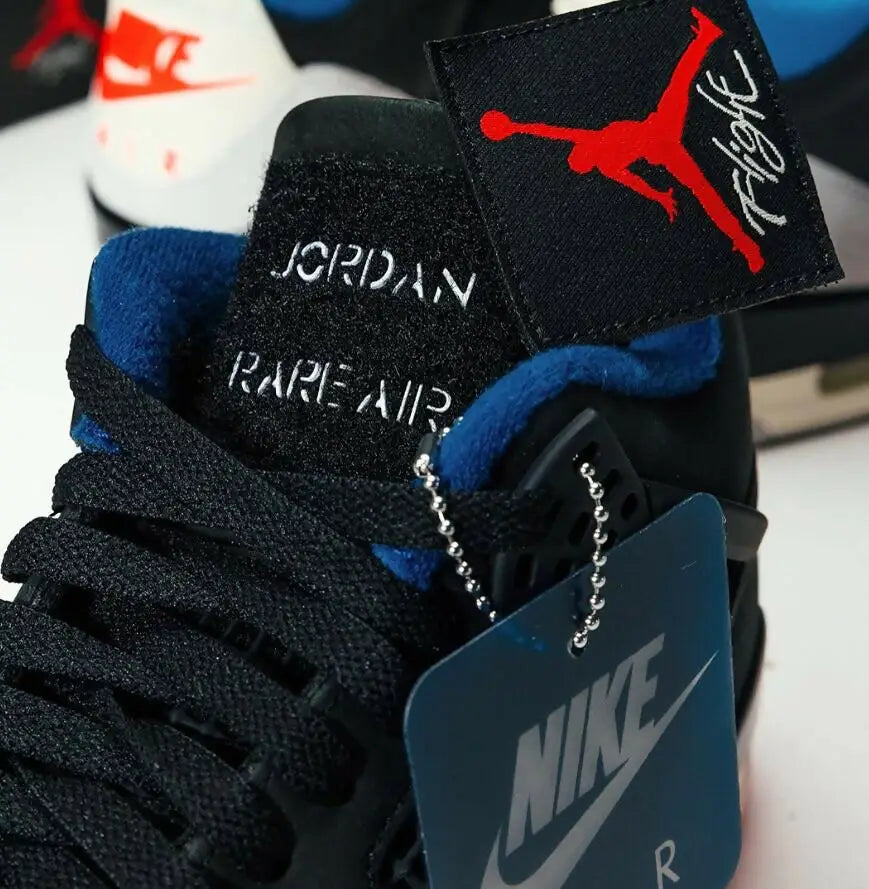 Black Air Jordan sneakers with blue accents from Air Jordan 4 Retro Rare Air, fast shipping