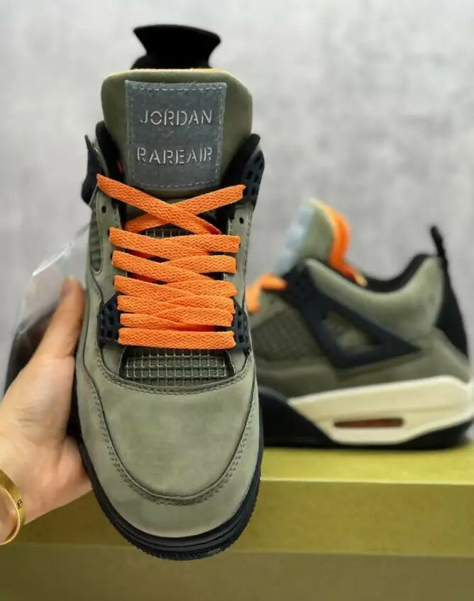 Olive green Air Jordan 4 Undefeated sneaker with bright orange laces, fast shipping available