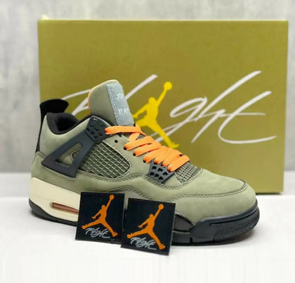 Olive green and black Air Jordan 4 Undefeated sneakers with orange laces, fast shipping