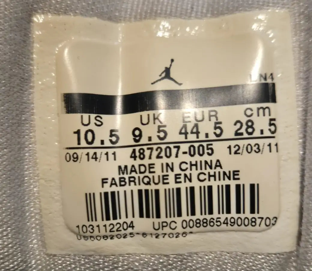 Air Jordan cool grey shoe size label with black text and Jumpman logo