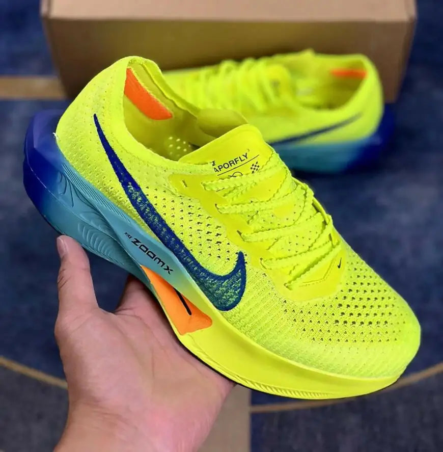 Vibrant neon yellow Air Zoom Alphafly Next Vaporfly 3 running shoe with blue teal heel
