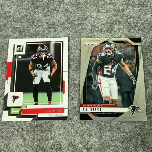 Two A.J. Terrell Atlanta Falcons football trading cards from 2022 to 2024 set