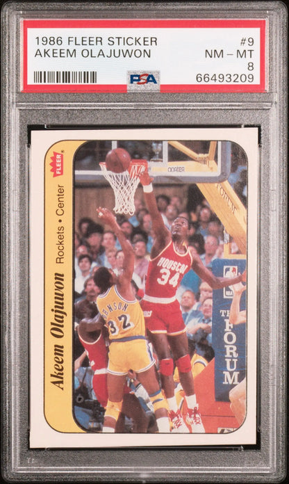 Akeem Olajuwon 1986 Fleer Stickers #9 PSA 8 in NM-MT condition for trading card collectors