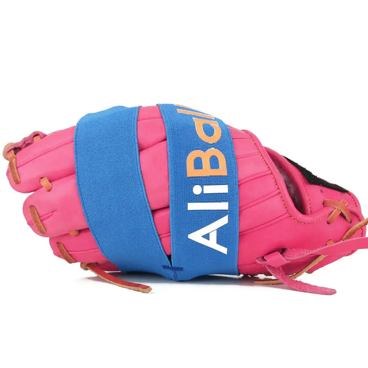 Pink softball glove wrap with blue strap for quick break-in using hot water and easy fit