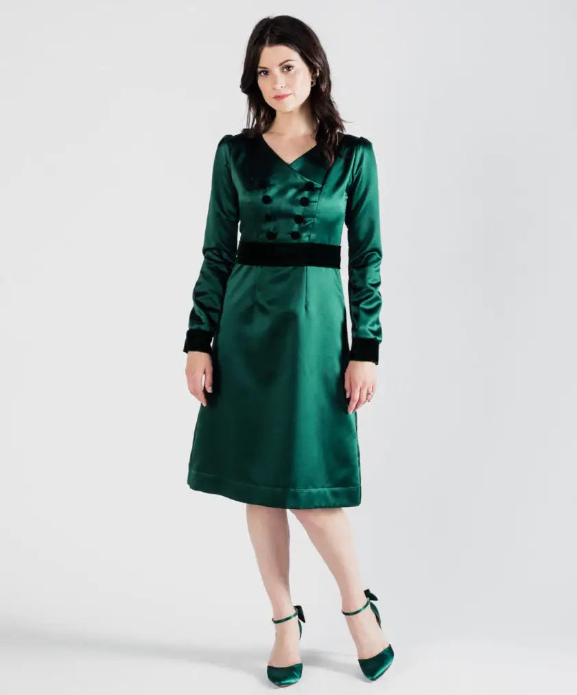 Emerald green poly satin Paris Bloom Noel party dress with V-neck and velvet accents