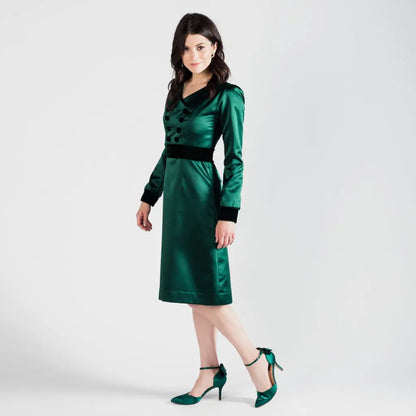 Emerald green poly satin midi dress with black velvet trim and ankle-strap heels from Paris Bloom Noel