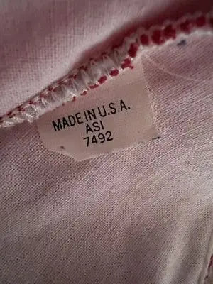 Clothing label with MADE IN U.S.A. and ASI 7492 on Alpo Red Corduroy SnapBack Hat