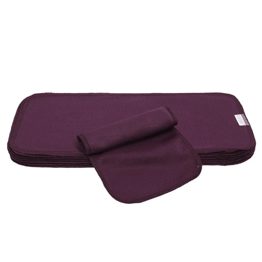 Stack of purple athletic wicking jersey cloth diaper inserts in ALVABABY 12 pack
