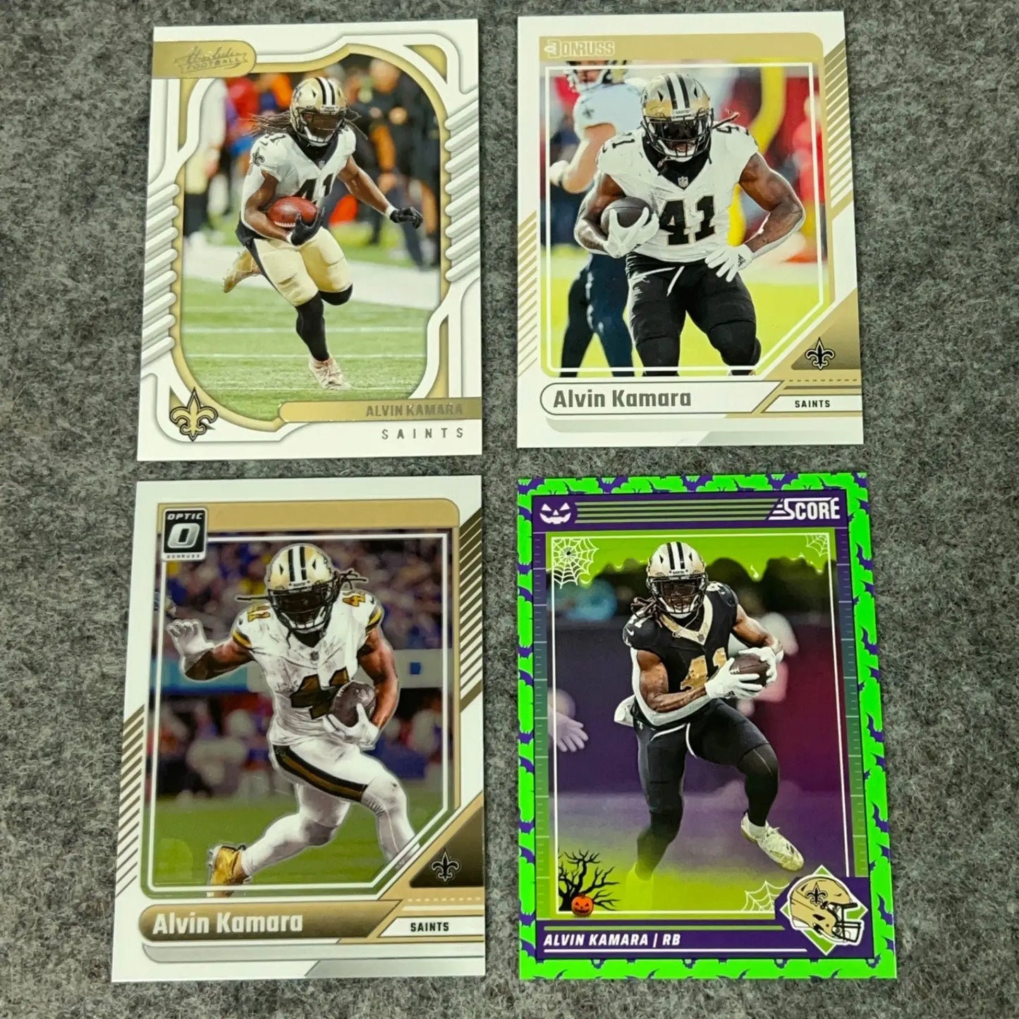 Four Alvin Kamara New Orleans Saints football trading cards in a pick set