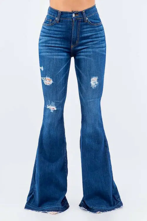 Amber Bell Bottom Jean featuring dark wash distressed flare jeans with high rise and unfinished hem