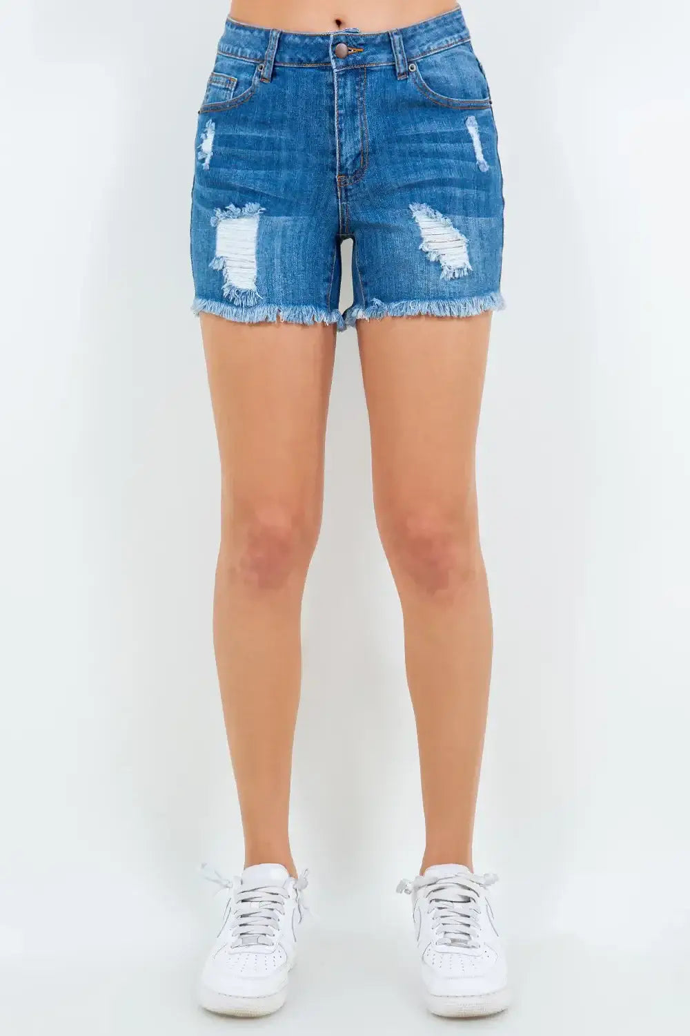 American Bazi high waist distressed denim shorts with frayed hem on a person