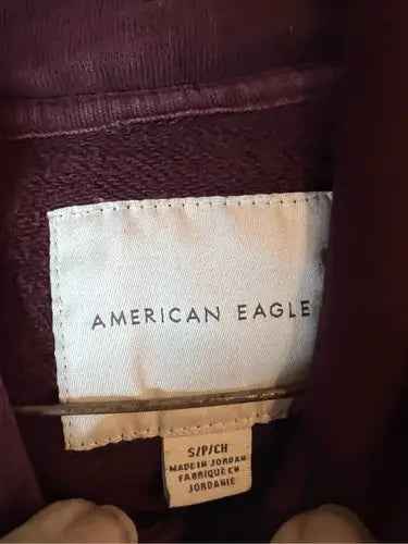 Maroon American Eagle hoodie with white brand label, stylish American Eagle hoodie