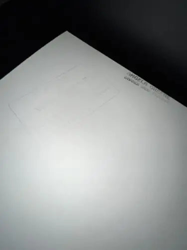 White rectangular surface of Angela Greene John F. Kennedy signed photo for trading cards