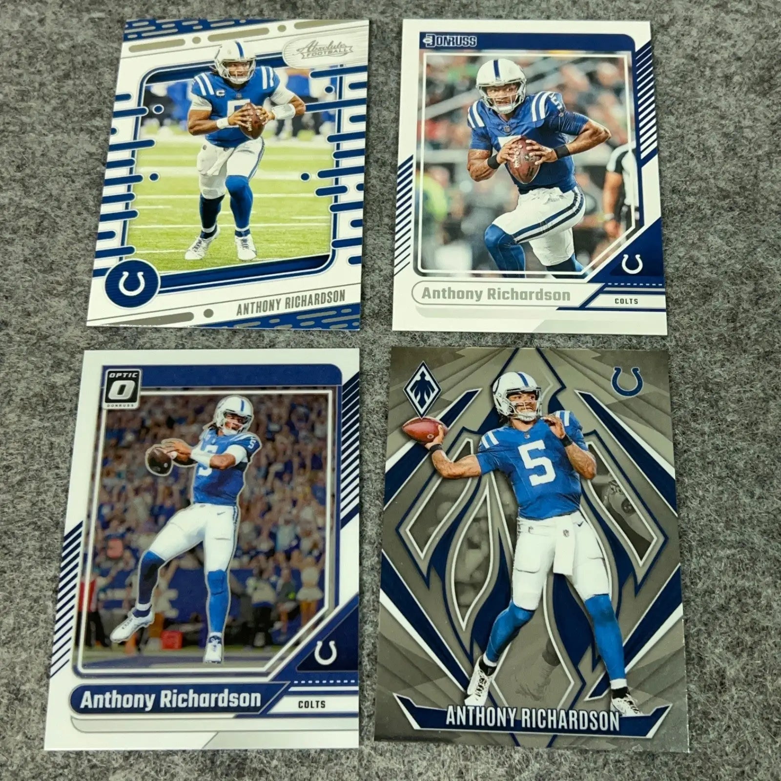 Four Anthony Richardson rookie football cards in mint preowned condition from Panini 2024 collection