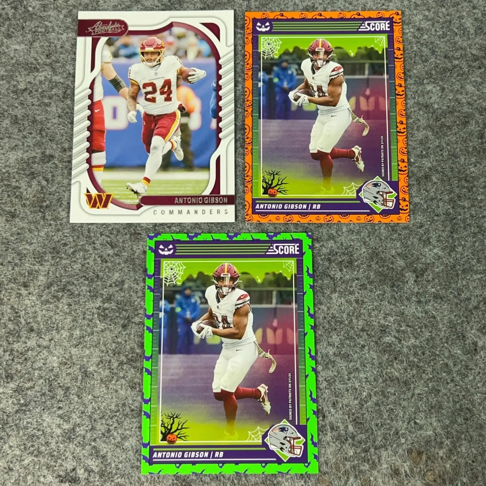 Three Antonio Gibson Washington football trading cards in mint preowned condition