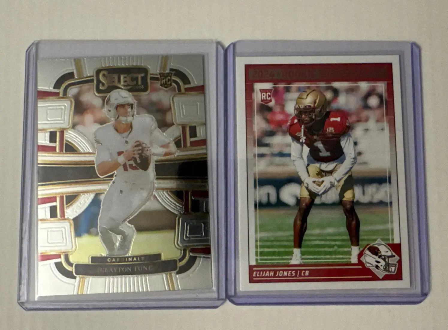 Arizona Cardinals Cardinals RC Lot featuring two football trading cards in protective cases