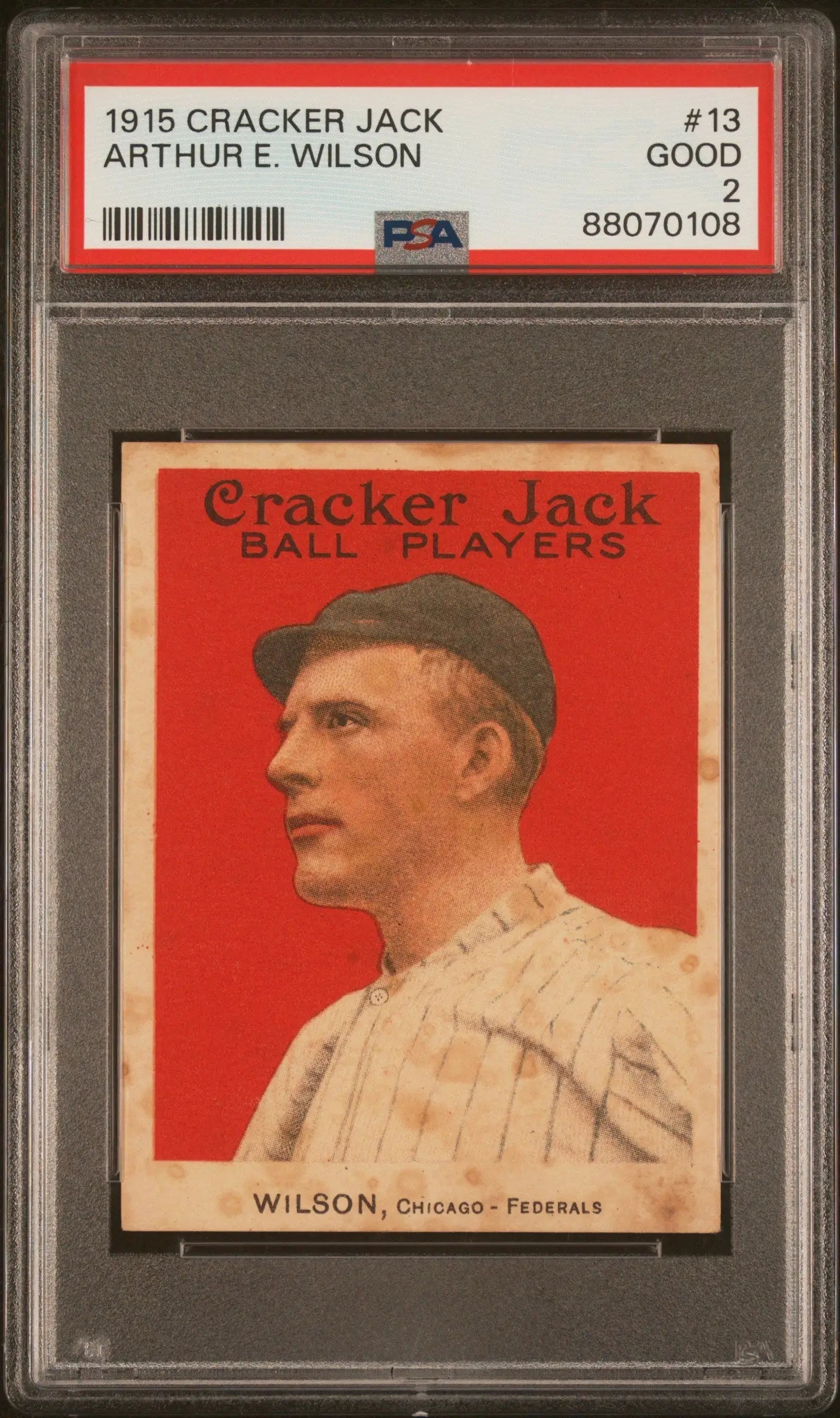 1915 Cracker Jack baseball card featuring Arthur E. Wilson in a white uniform