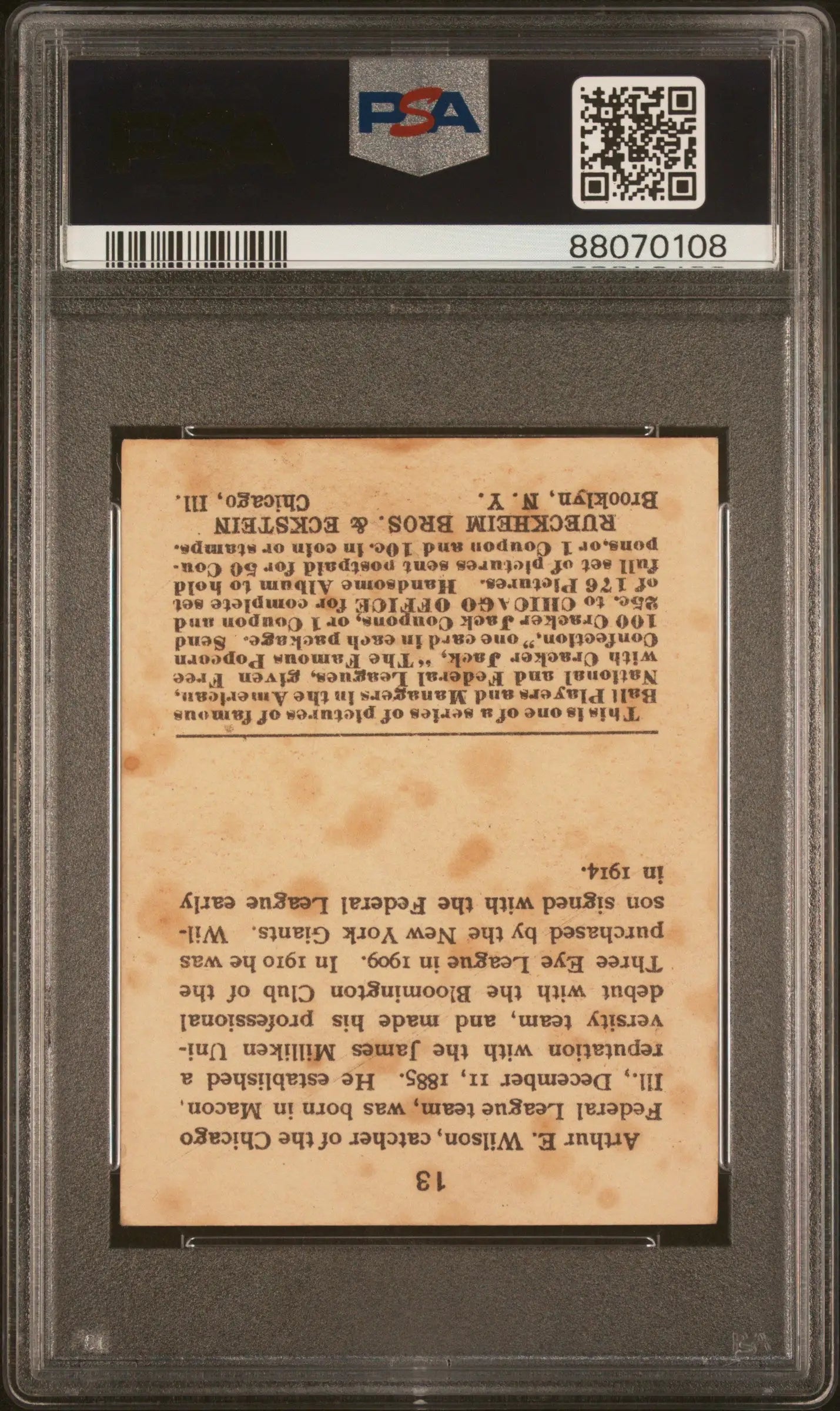 PSA-graded Arthur E. Wilson Cracker Jack trading card on light background
