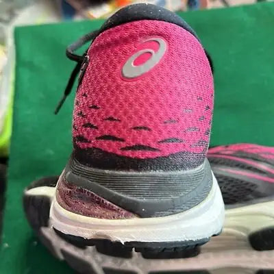 Bright pink and black ASICS Women’s GEL-CUMULUS 19 athletic shoe with white sole
