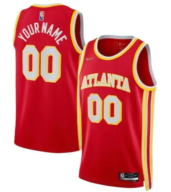 Two red Atlanta Hawks Nike 2021/22 Diamond Swingman jerseys with yellow and white accents
