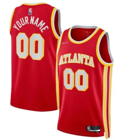 Two red Atlanta Hawks Nike 2021/22 Diamond Swingman jerseys with yellow and white accents