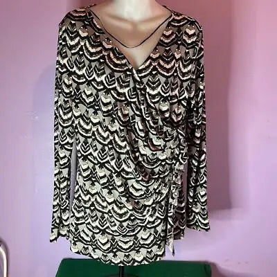 Black and white patterned long sleeve faux wrap top from Attention Women’s blouse