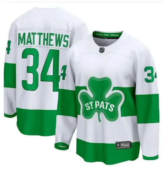 White and green Auston Matthews Toronto Maple Leafs C Premier Breakaway jersey with shamrock logo