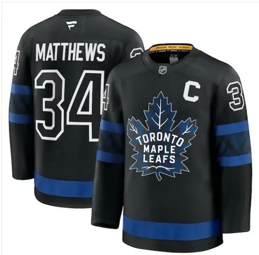 Black Toronto Maple Leafs hockey jersey with blue accents and number 34 featuring Auston Matthews patch