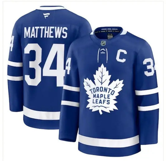 Blue and white Toronto Maple Leafs hockey jersey with Matthews 34 and logo front