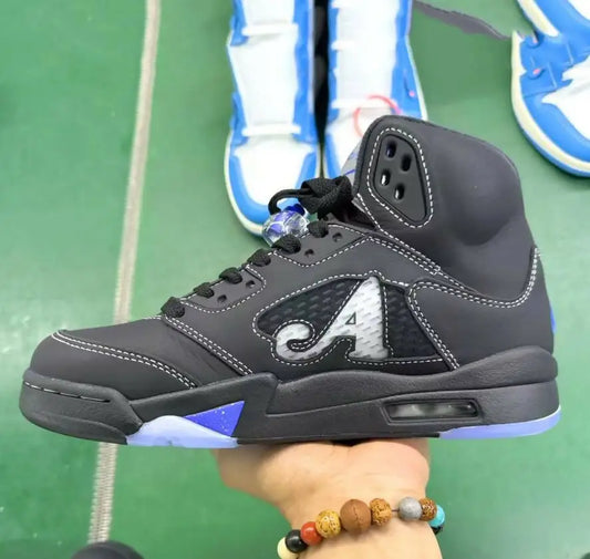 Black high-top sneaker with white A logo, blue accents, fast shipping, business days depending