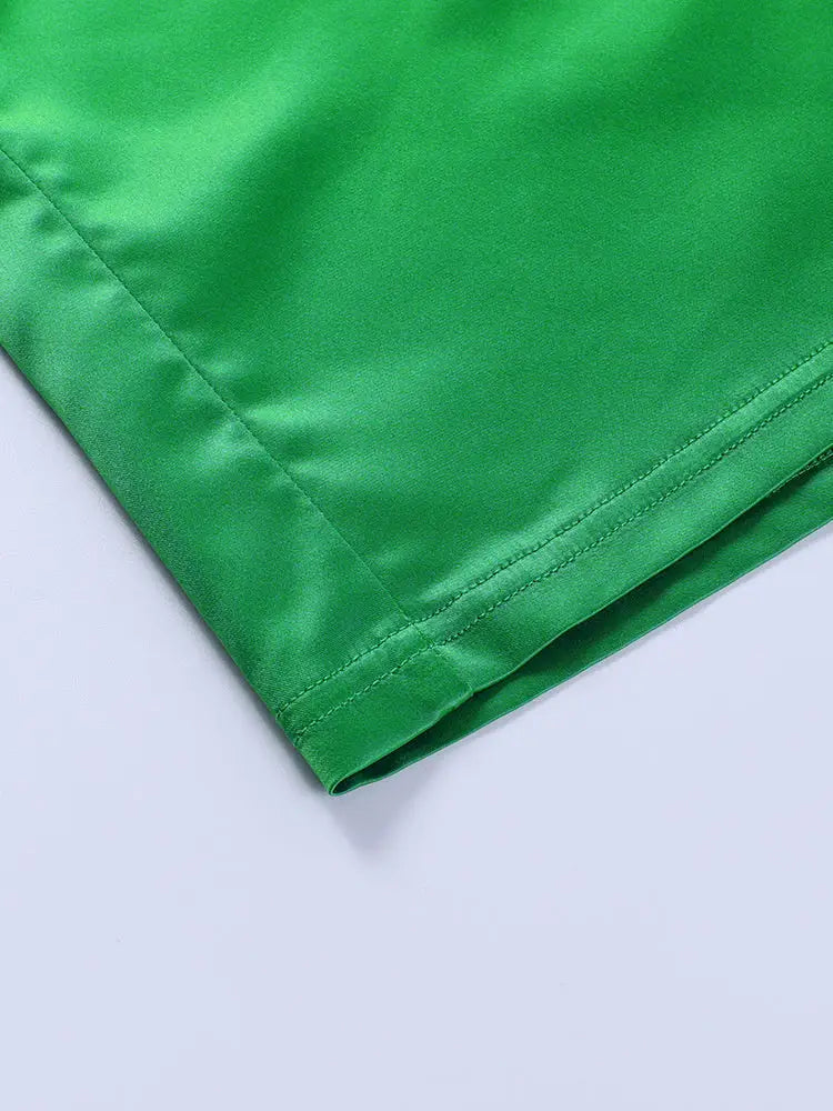 Green satin fabric with visible stitching for backless maxi dress gown halter sleeveless