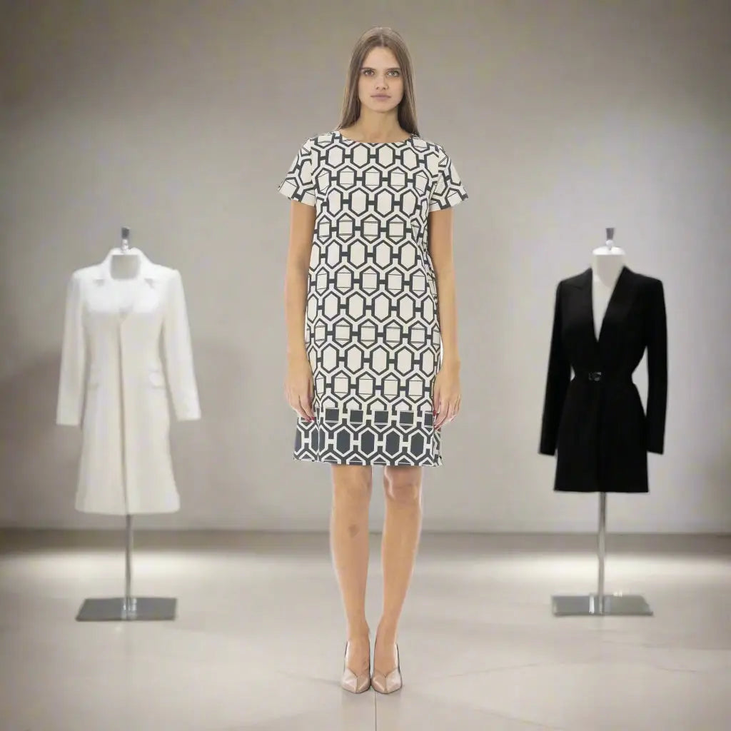 Baldinini Trend black and white graphic print dress with mannequins and nude heels