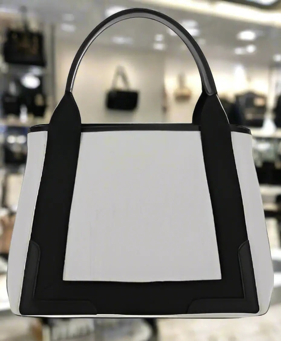 Balenciaga cotton tote bag with black leather trim and shoulder strap